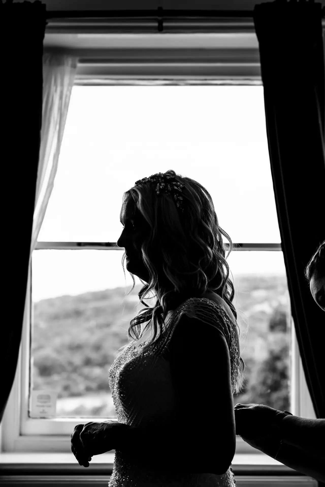 Bride and groom exchanging vows inside a rustic Gloucestershire church